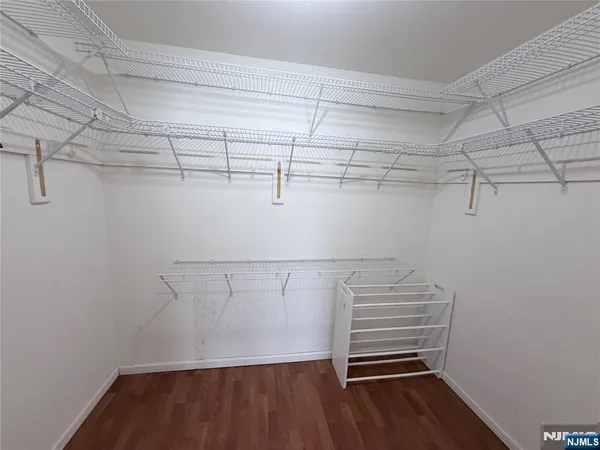 a view of a room with racks on the wall