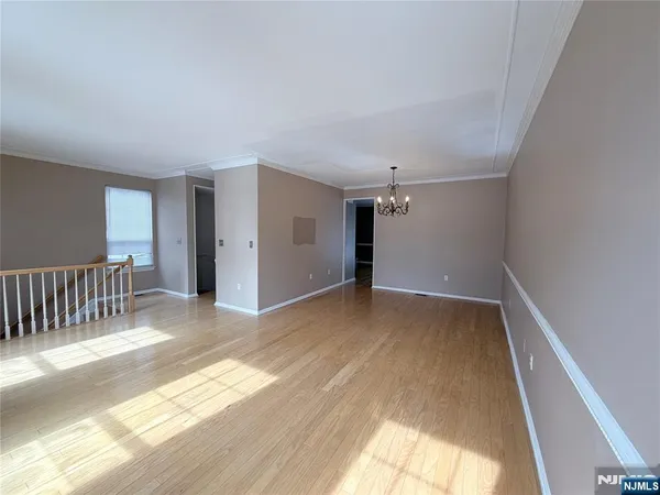 a view of a hallway with closet area