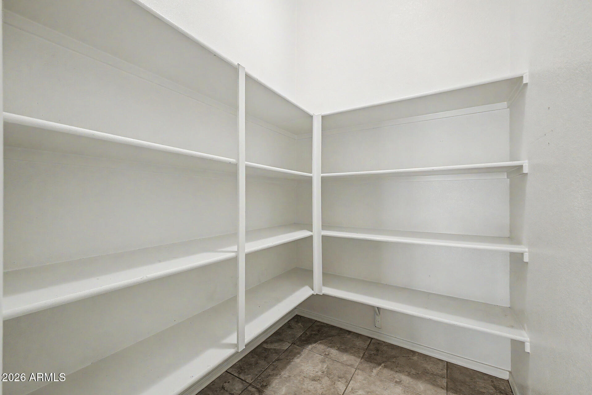 2725 East Mine Creek Road, Unit 2172 Phoenix, AZ 85024 - Photo 9 of 28 a view of an empty walk in closet