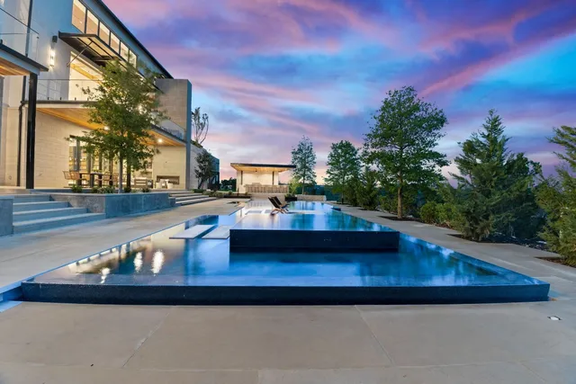 a view of a swimming pool with an outdoor space