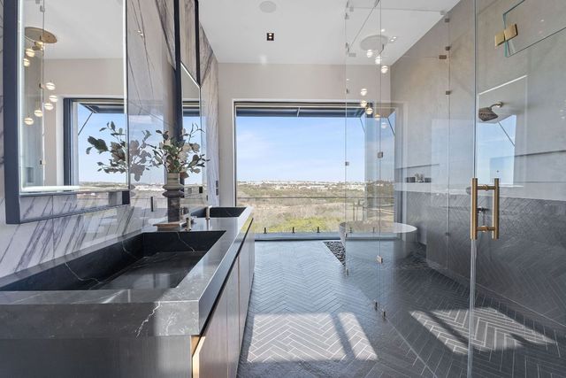 a kitchen with a refrigerator and a sink