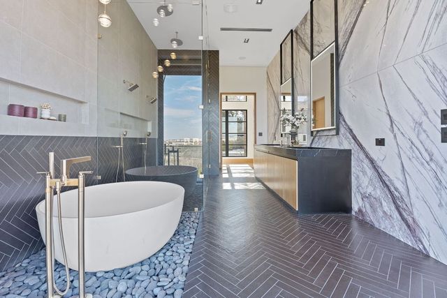 a large white tub sitting in a kitchen