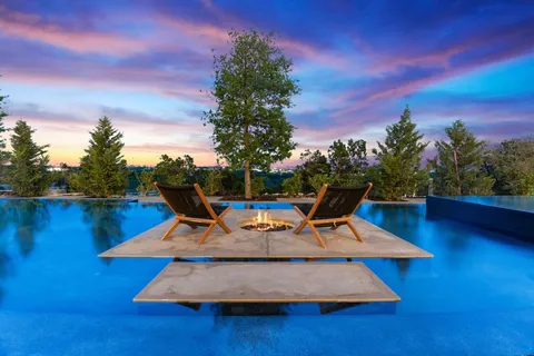 a wooden bench sitting in the middle of a building