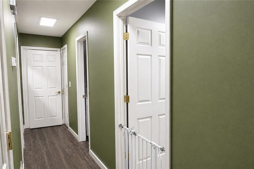 2033 Carson Segars Road Maysville, GA 30558 - Photo 17 of 41 a view of a hallway with wooden floor