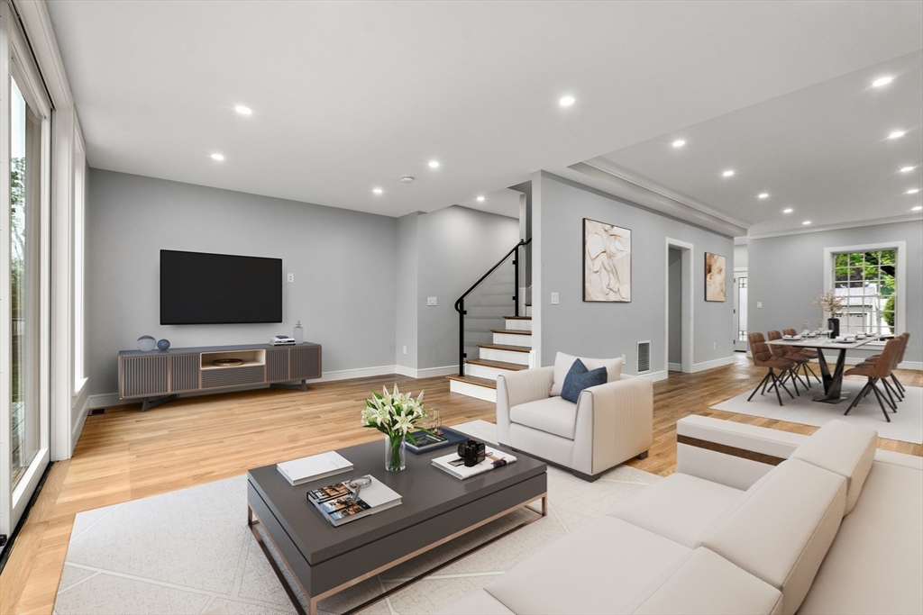 121 Oliver Road Belmont, MA 02478 - Photo 13 of 34 a living room with furniture and a flat screen tv