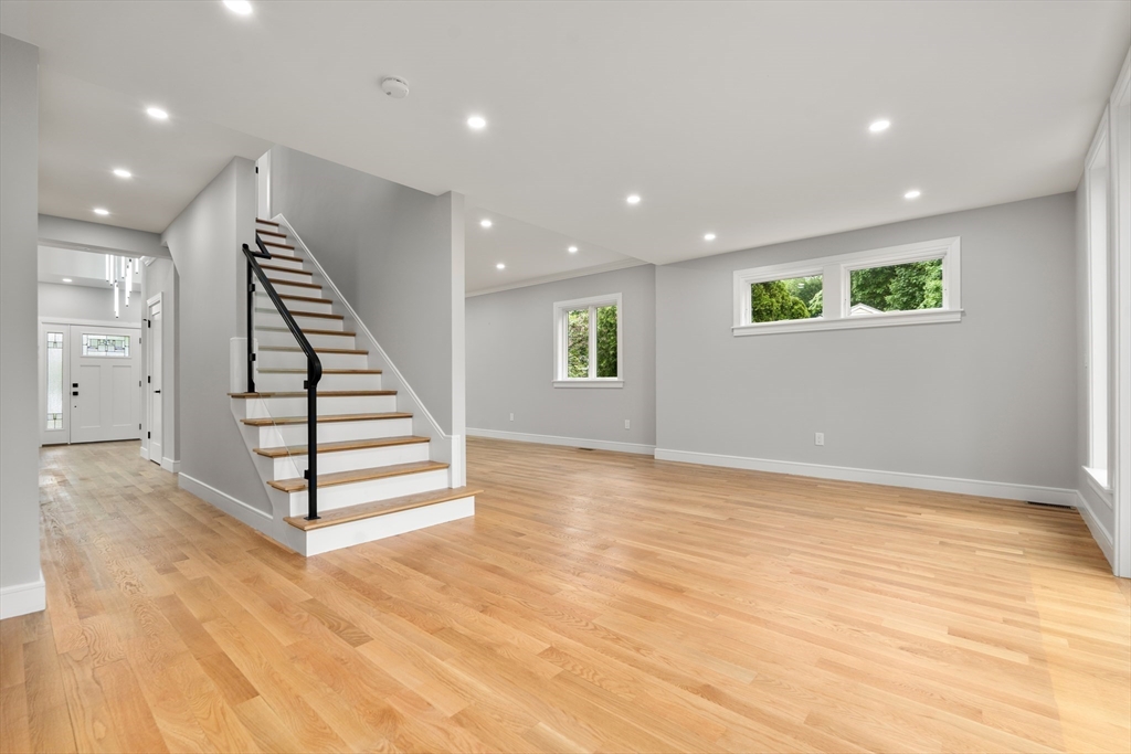 121 Oliver Road Belmont, MA 02478 - Photo 15 of 34 an empty room with wooden floor and entryway
