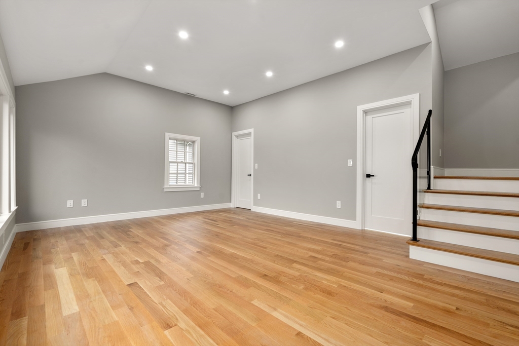 121 Oliver Road Belmont, MA 02478 - Photo 17 of 34 a view of an empty room with wooden floor and a window