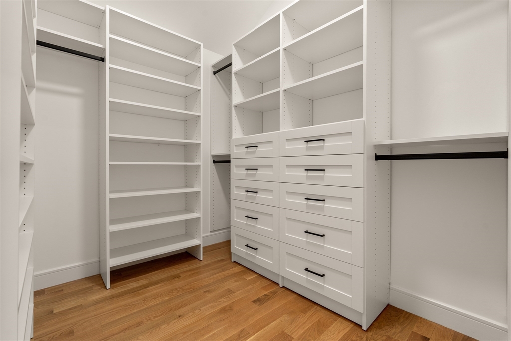 121 Oliver Road Belmont, MA 02478 - Photo 21 of 34 a view of walk in closet with empty racks