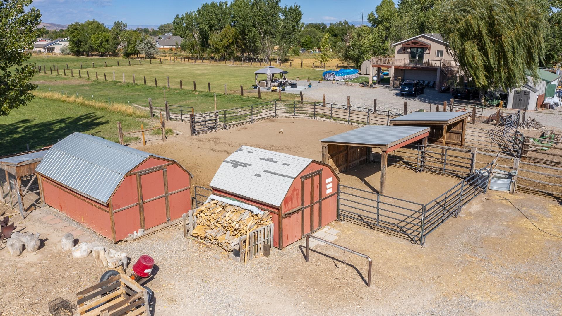 967 18 Road Fruita, CO 81521 - Photo 14 of 39 an aerial view of a house with garden space and street view