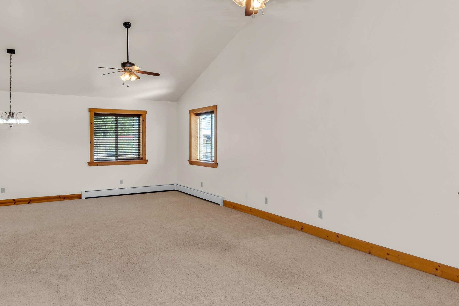 967 18 Road Fruita, CO 81521 - Photo 20 of 39 an empty room with windows and ceiling fan
