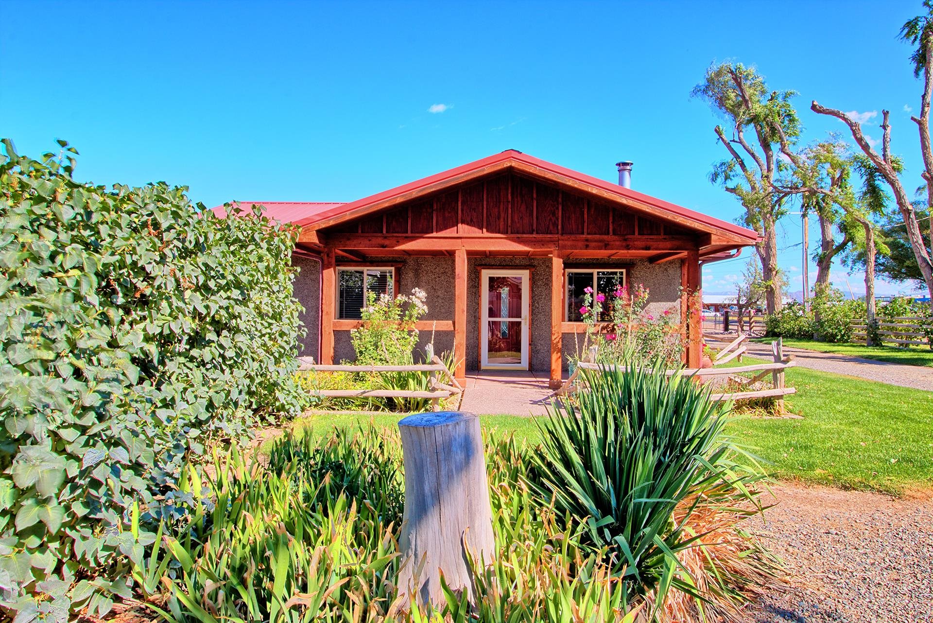 967 18 Road Fruita, CO 81521 - Photo 4 of 39 a front view of a house with garden