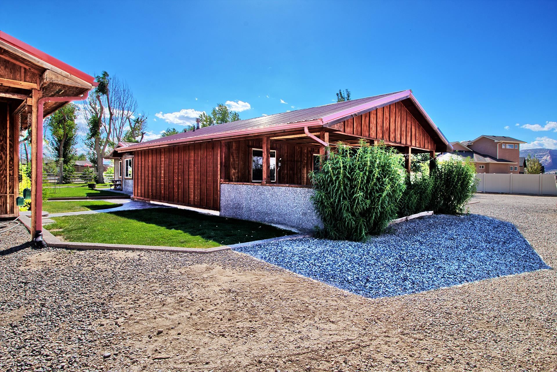 967 18 Road Fruita, CO 81521 - Photo 7 of 39 a front view of a house with garden