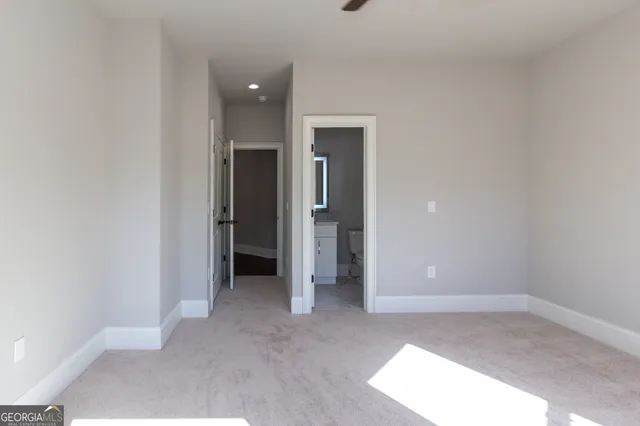 a bathroom with a granite countertop sink mirror and double