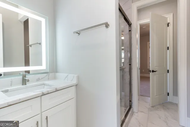 a view of a room with wooden walls