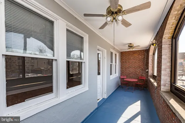 a view of front door of house with a street