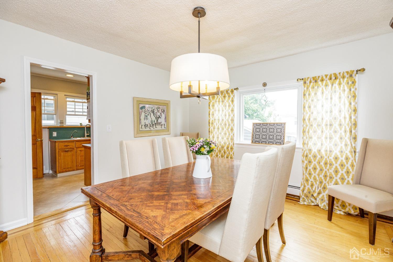 215 Hillside Road Elizabeth, NJ 07208 - Photo 11 of 37 a dining room with furniture and window