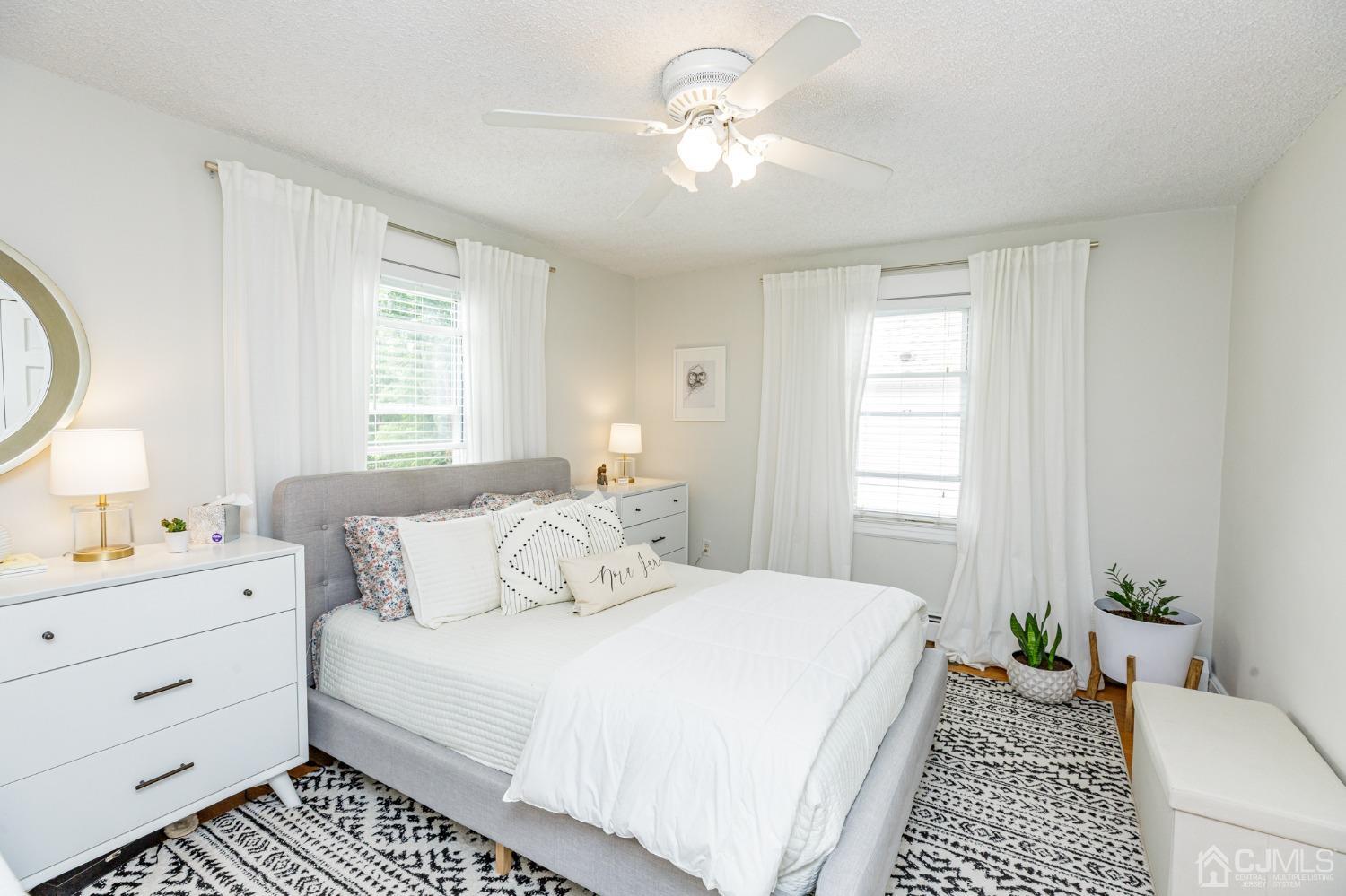 215 Hillside Road Elizabeth, NJ 07208 - Photo 19 of 37 a bedroom with a bed and a window