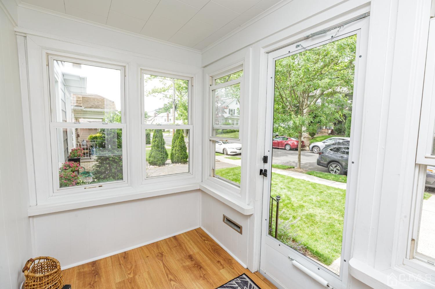 215 Hillside Road Elizabeth, NJ 07208 - Photo 2 of 37 a room with a bed and a window