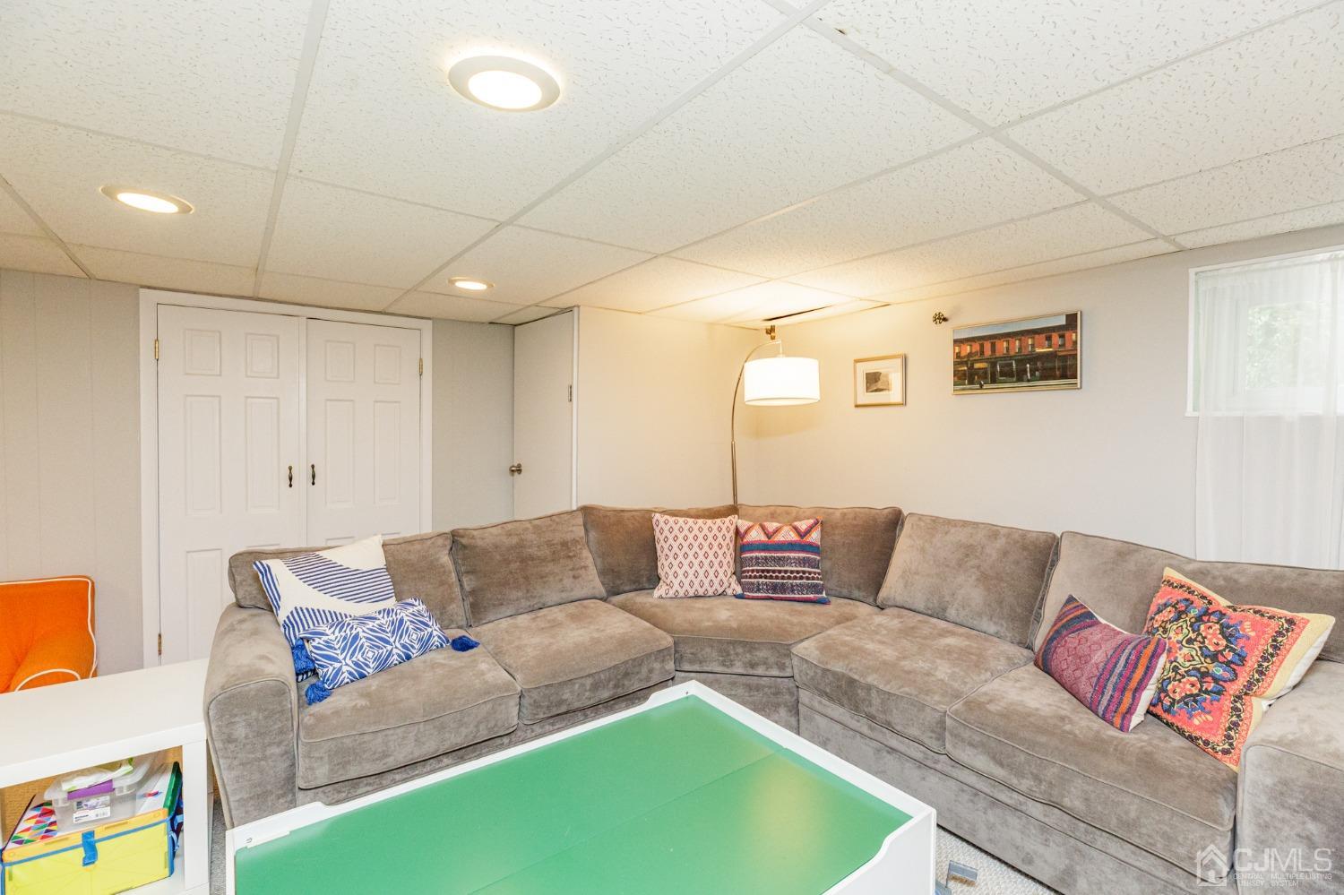 215 Hillside Road Elizabeth, NJ 07208 - Photo 27 of 37 a living room with furniture and a couch