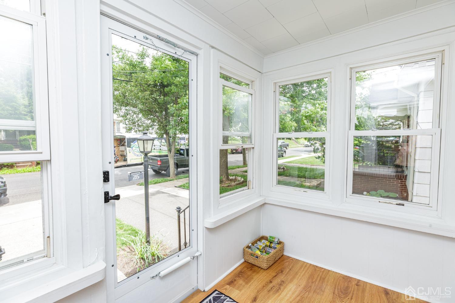 215 Hillside Road Elizabeth, NJ 07208 - Photo 3 of 37 a living room filled with furniture and a large window
