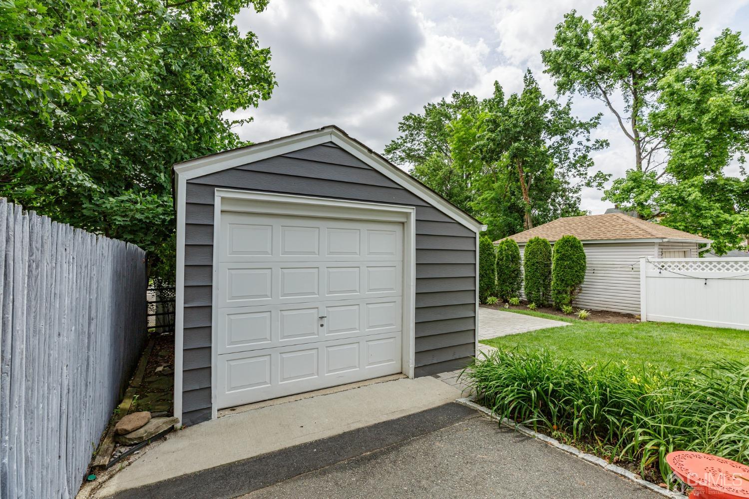 215 Hillside Road Elizabeth, NJ 07208 - Photo 35 of 37 a front view of a house with a yard