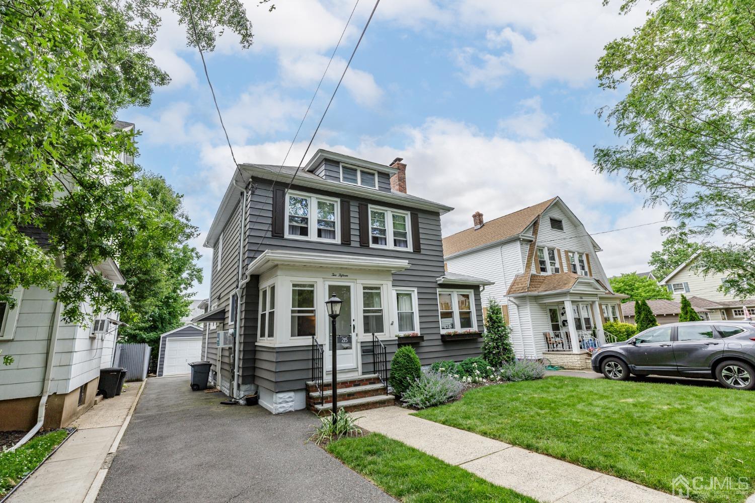 215 Hillside Road Elizabeth, NJ 07208 - Photo 37 of 37 a front view of a house with a garden