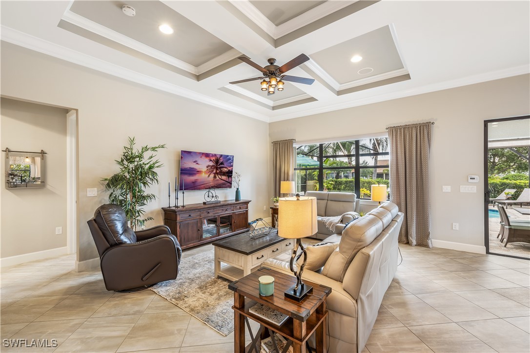 12894 Epping Way Fort Myers, FL 33913 - Photo 11 of 49 a living room with couch a dining table and a potted plant