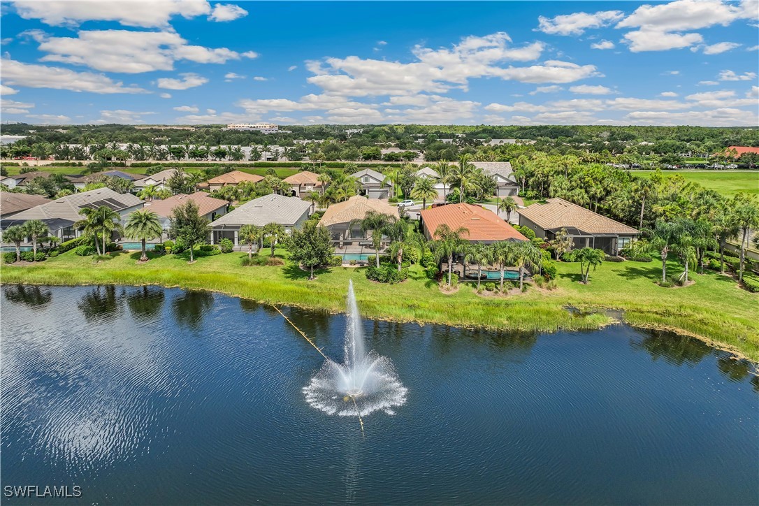 12894 Epping Way Fort Myers, FL 33913 - Photo 20 of 49 a view of a lake with a mountain in the background