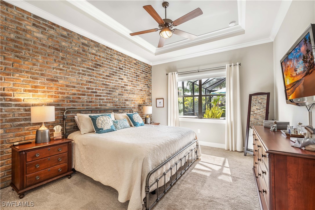 12894 Epping Way Fort Myers, FL 33913 - Photo 22 of 49 a bedroom with a bed dresser and a window