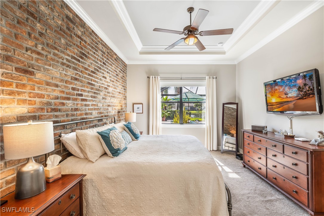 12894 Epping Way Fort Myers, FL 33913 - Photo 23 of 49 a bedroom with furniture and a flat screen tv