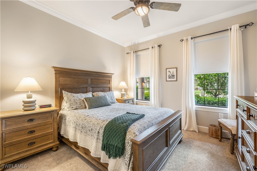 12894 Epping Way Fort Myers, FL 33913 - Photo 26 of 49 a bedroom with a bed and a window