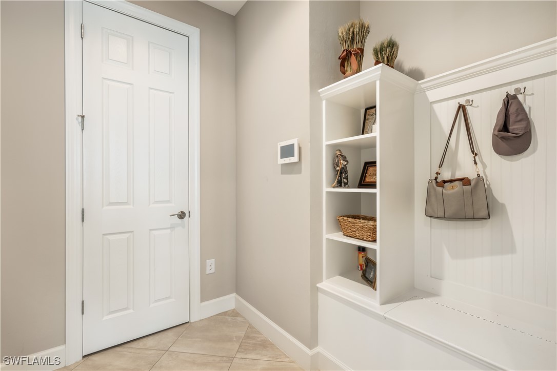 12894 Epping Way Fort Myers, FL 33913 - Photo 28 of 49 a view of walk in closet with clothes and shoes