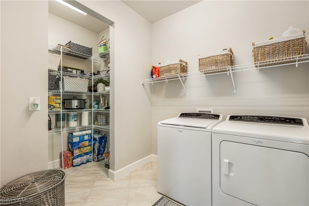 12894 Epping Way Fort Myers, FL 33913 - Photo 29 of 49 a utility room with dryer and washer