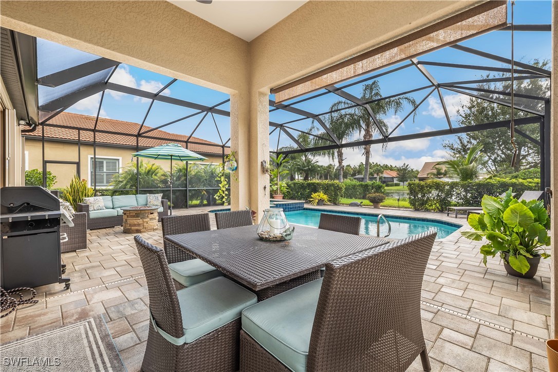 12894 Epping Way Fort Myers, FL 33913 - Photo 30 of 49 a view of an outdoor dining space with a table and chairs
