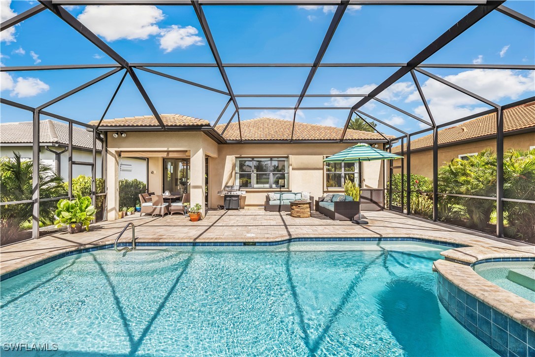 12894 Epping Way Fort Myers, FL 33913 - Photo 34 of 49 a view of a swimming pool with a patio