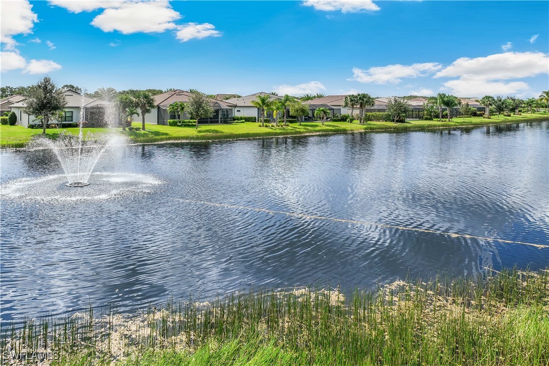 12894 Epping Way Fort Myers, FL 33913 - Photo 41 of 49 a view of a lake with houses