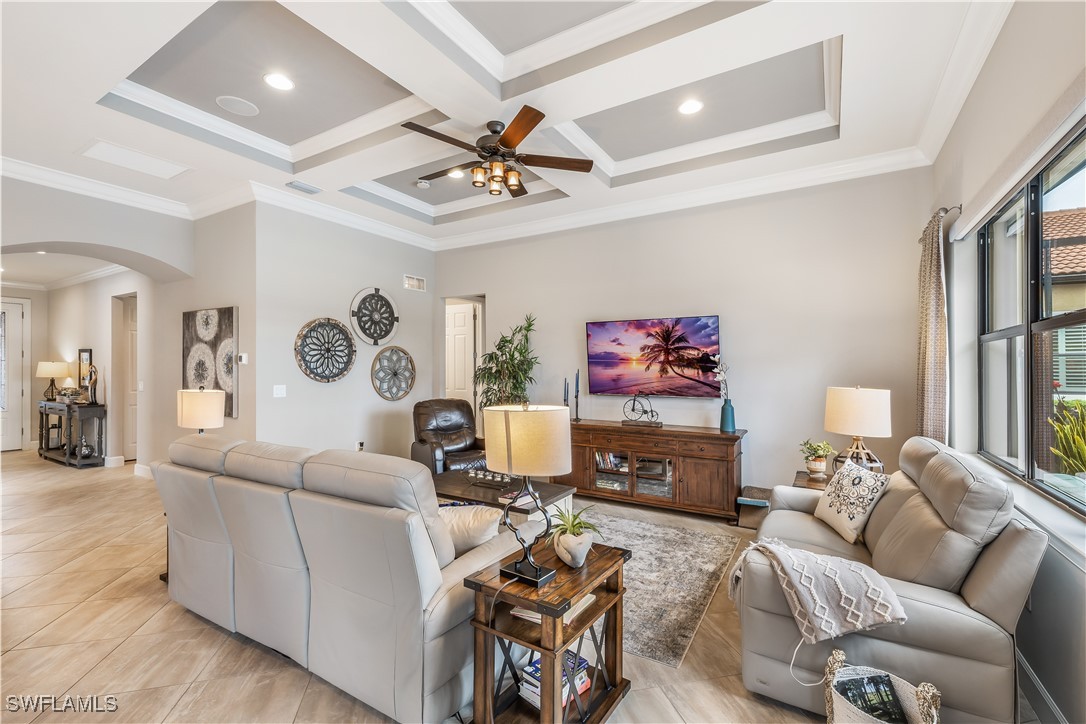 12894 Epping Way Fort Myers, FL 33913 - Photo 10 of 49 a living room with furniture and a flat screen tv