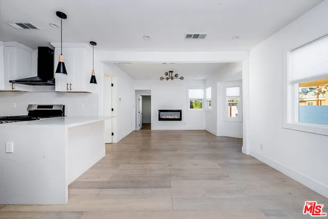 a view of a kitchen with a sink cabinets and a window
