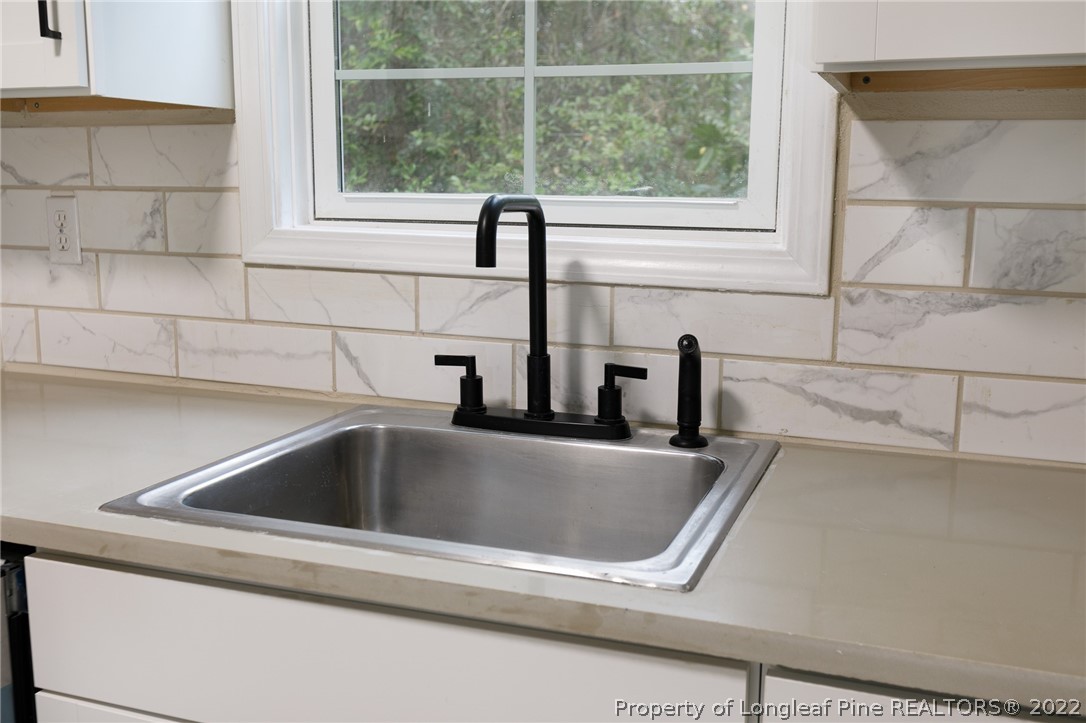 595 Midway Road Aberdeen, NC 28315 - Photo 12 of 22 a close view of sink and window