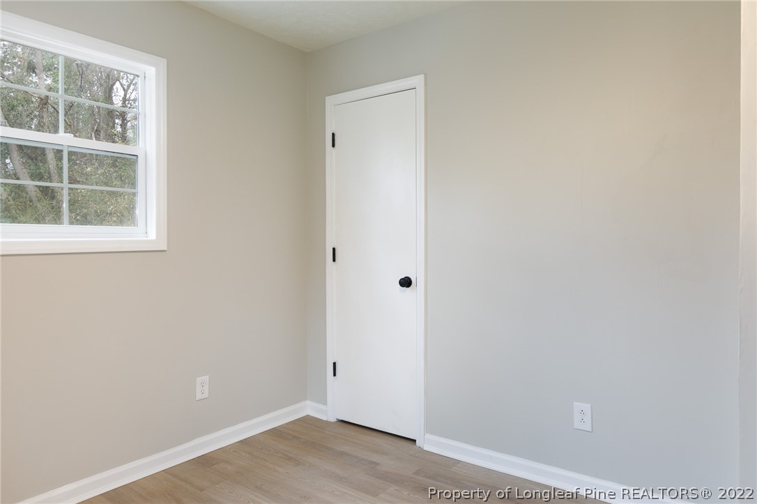 595 Midway Road Aberdeen, NC 28315 - Photo 14 of 22 a view of empty room with window