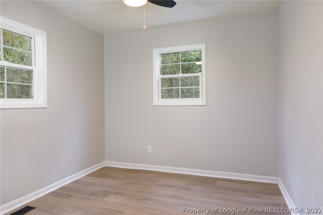595 Midway Road Aberdeen, NC 28315 - Photo 20 of 22 an empty room with a window