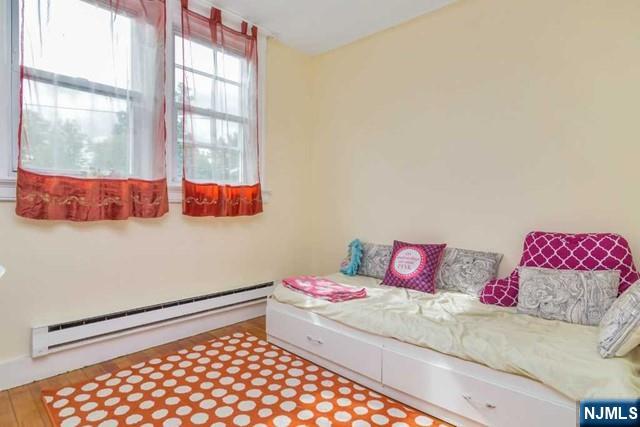 48 Stelfox Street Demarest, NJ 07627 - Photo 14 of 19 a bedroom with a bed and a window