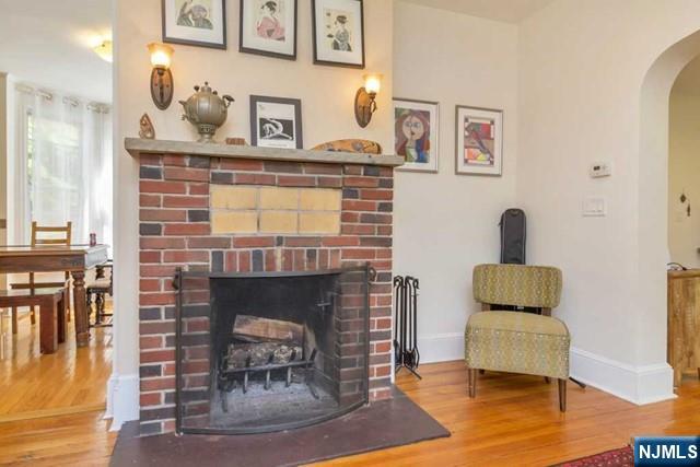 48 Stelfox Street Demarest, NJ 07627 - Photo 6 of 19 a living room with furniture and a fireplace