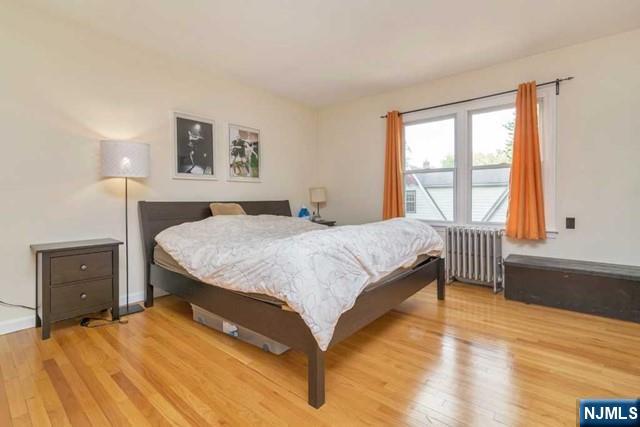 48 Stelfox Street Demarest, NJ 07627 - Photo 9 of 19 a bedroom with a bed and a window