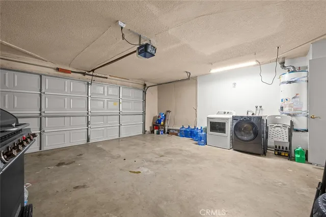 a view of a garage with washing machine