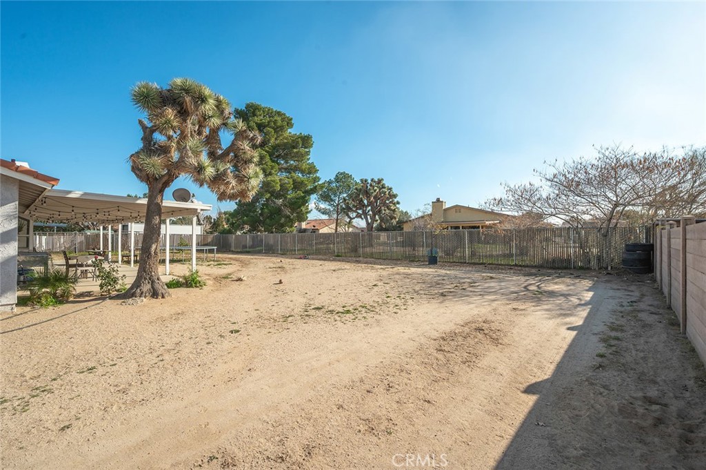 15811 Hercules Street Hesperia, CA 92345 - Photo 33 of 43 a view of a backyard of a house
