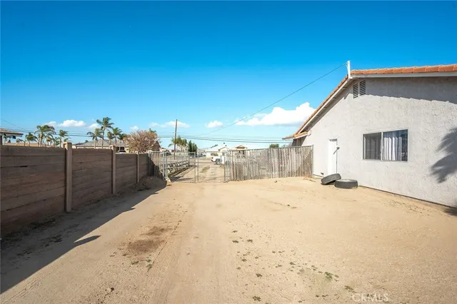 an aerial view of a house with a ocean view
