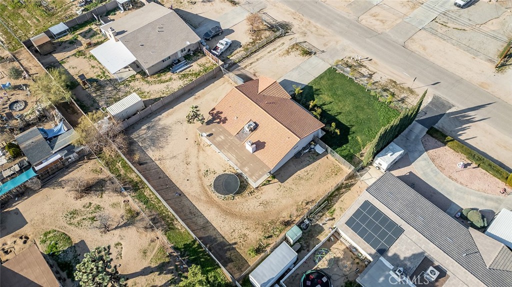 15811 Hercules Street Hesperia, CA 92345 - Photo 37 of 43 an aerial view of a house with a yard