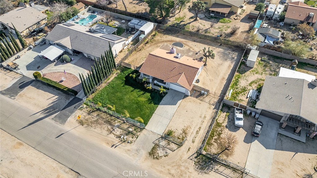 15811 Hercules Street Hesperia, CA 92345 - Photo 38 of 43 an aerial view of a house with a yard