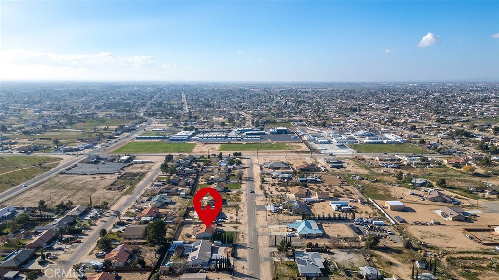 15811 Hercules Street Hesperia, CA 92345 - Photo 42 of 43 an aerial view of residential houses with outdoor space